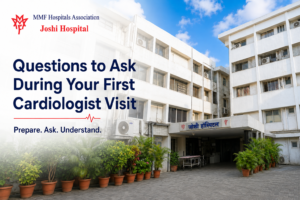 Patient discussing heart health questions during a cardiologist consultation at Joshi Hospital